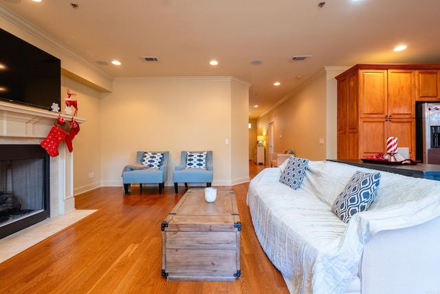 100 Vallon Ln, Little Rock, AR 72223 - living area with a fireplace with flush hearth, light wood-type flooring, crown molding, and recessed lighting