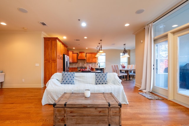 100 Vallon Ln, Little Rock, AR 72223 - living room featuring recessed lighting, light wood-style floors, and ornamental molding