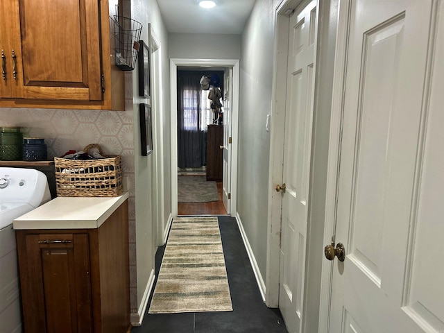 102 Mockingbird Ln, Arkadelphia, AR 71923 - laundry area with cabinet space, washer / dryer, and wallpapered walls