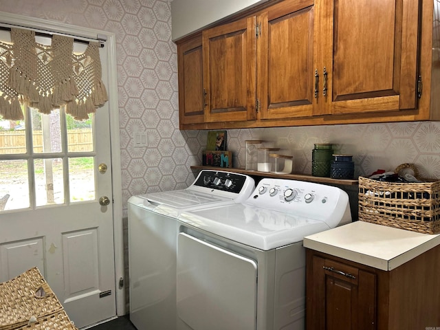 102 Mockingbird Ln, Arkadelphia, AR 71923 - laundry area with washing machine and dryer, cabinet space, and wallpapered walls