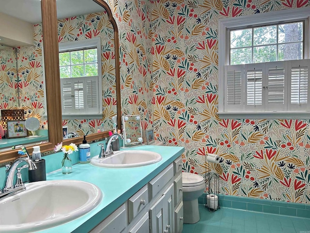 102 Mockingbird Ln, Arkadelphia, AR 71923 - bathroom featuring wallpapered walls, double vanity, and tile patterned floors