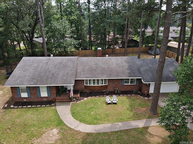 102 Mockingbird Ln, Arkadelphia, AR 71923 - view of front facade featuring brick siding and a shingled roof