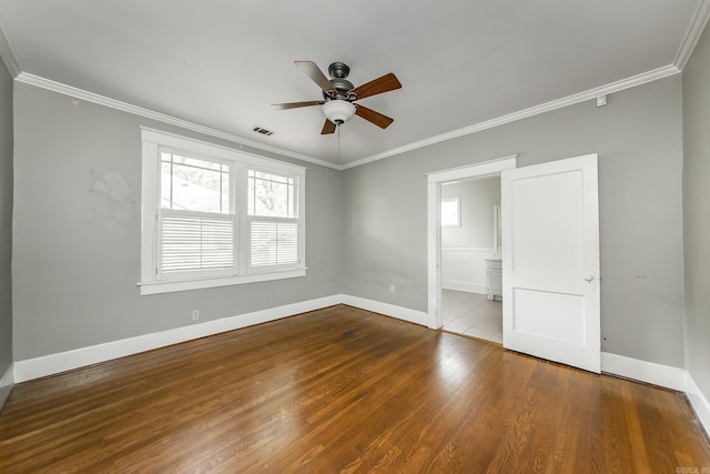 4106 C St, Little Rock, AR 72205 - unfurnished bedroom with ornamental molding, wood finished floors, ensuite bath, and a ceiling fan