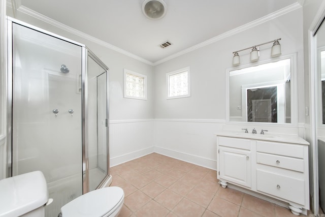 4106 C St, Little Rock, AR 72205 - bathroom with vanity, a stall shower, ornamental molding, wainscoting, and tile patterned flooring
