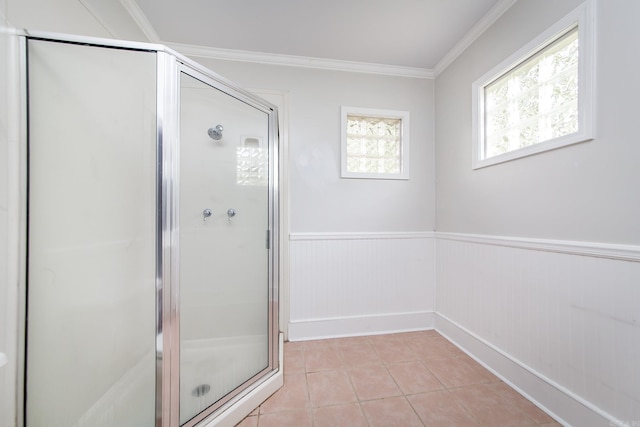 4106 C St, Little Rock, AR 72205 - bathroom with wainscoting, a stall shower, tile patterned floors, and crown molding