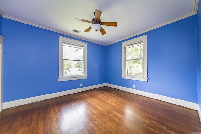 4106 C St, Little Rock, AR 72205 - empty room featuring plenty of natural light, wood finished floors, ceiling fan, and ornamental molding