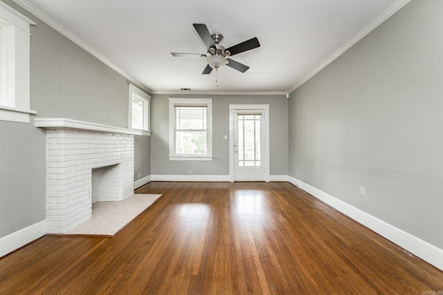 4106 C St, Little Rock, AR 72205 - unfurnished living room with a ceiling fan, wood finished floors, ornamental molding, and a fireplace