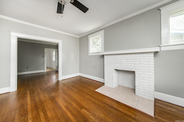 4106 C St, Little Rock, AR 72205 - unfurnished living room with a ceiling fan, ornamental molding, and wood finished floors