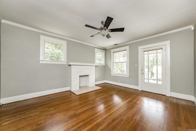 4106 C St, Little Rock, AR 72205 - unfurnished living room featuring plenty of natural light, ornamental molding, wood finished floors, and a ceiling fan