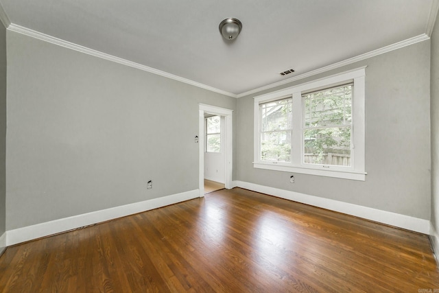 4106 C St, Little Rock, AR 72205 - spare room featuring ornamental molding and wood finished floors