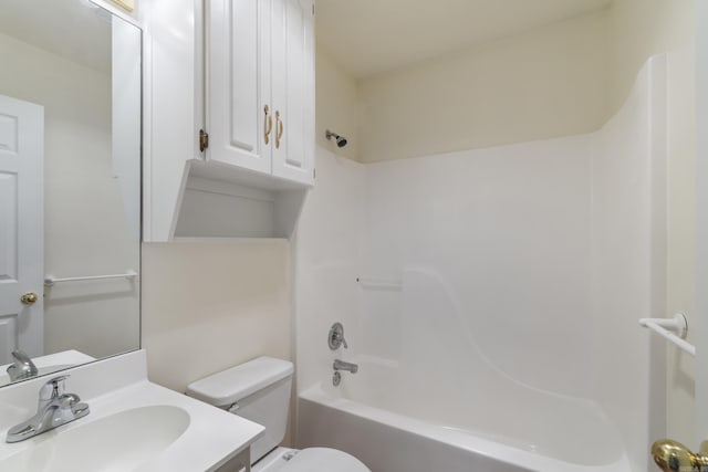 bathroom featuring bathing tub / shower combination and vanity