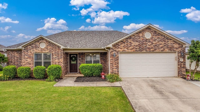27 Magnolia Ln, Ward, AR 72176 - view of front of house featuring brick siding, roof with shingles, driveway, and a garage