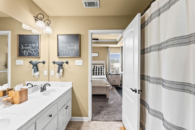 27 Magnolia Ln, Ward, AR 72176 - full bath with connected bathroom, double vanity, and tile patterned floors