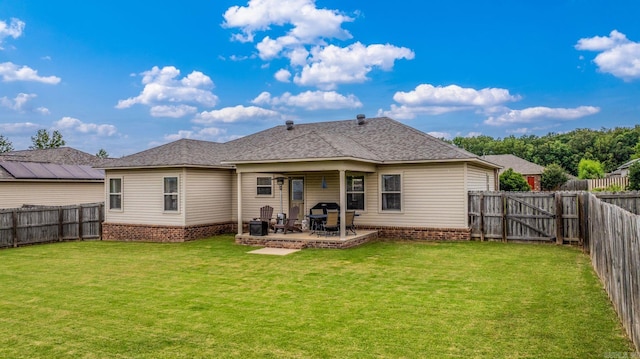 27 Magnolia Ln, Ward, AR 72176 - back of property with a fenced backyard, a patio, roof with shingles, and a gate