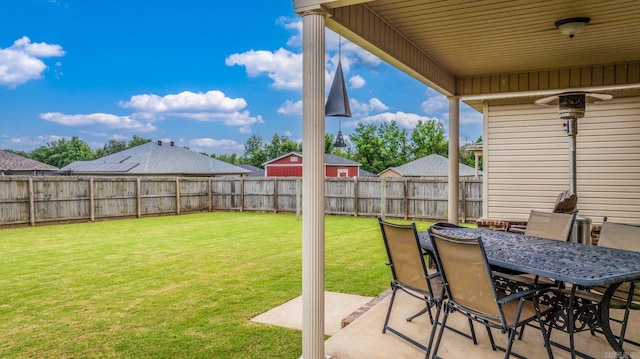27 Magnolia Ln, Ward, AR 72176 - fenced backyard with a patio and outdoor dining area