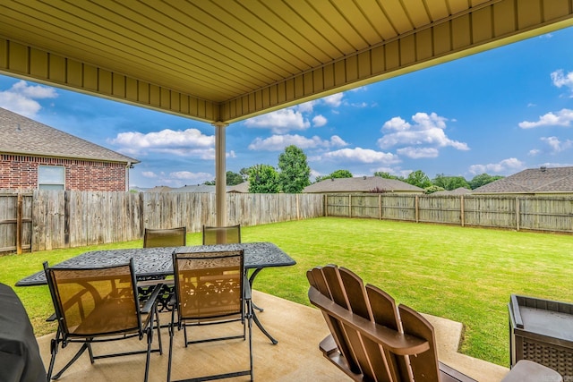 27 Magnolia Ln, Ward, AR 72176 - fenced backyard featuring a patio area and outdoor dining area