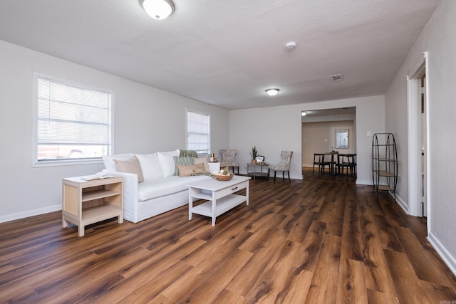1101 W Charles Bussey Ave, Little Rock, AR 72206 - living room with wood finished floors and baseboards