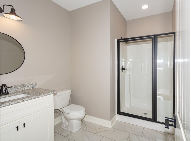 full bathroom featuring a stall shower, marble finish flooring, and vanity
