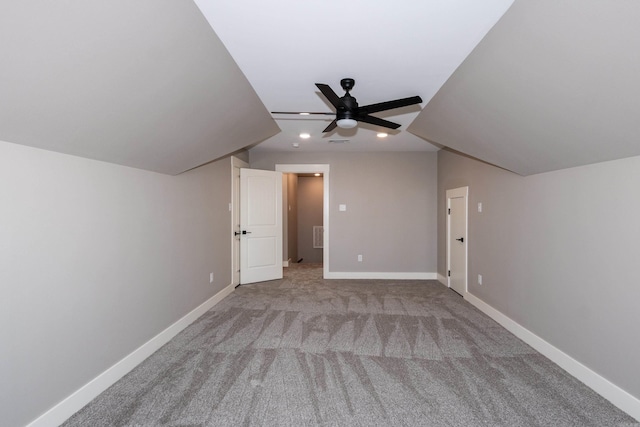 bonus room with recessed lighting, a ceiling fan, and carpet