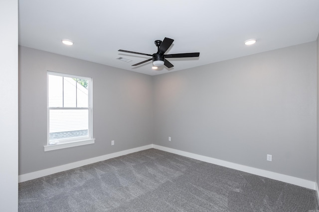 unfurnished room featuring dark carpet, ceiling fan, and recessed lighting