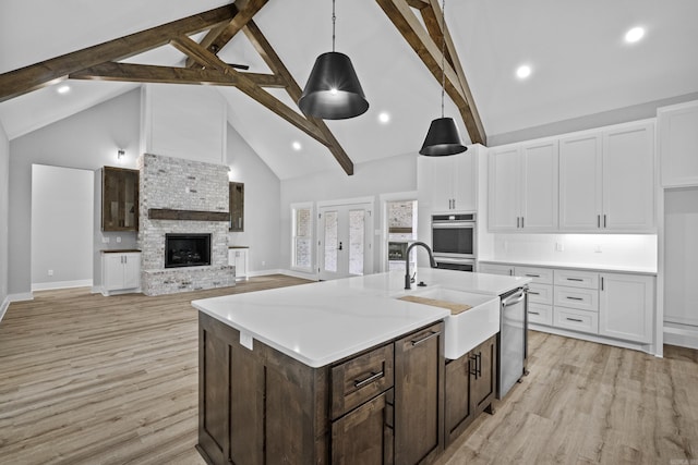 1500 Haley Ln, Conway, AR 72034 - kitchen featuring beamed ceiling, white cabinets, high vaulted ceiling, stainless steel appliances, and dark brown cabinets