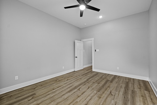 1500 Haley Ln, Conway, AR 72034 - spare room with a ceiling fan, wood finished floors, and recessed lighting