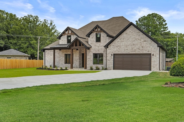 1500 Haley Ln, Conway, AR 72034 - french country home with driveway, brick siding, a garage, and a standing seam roof