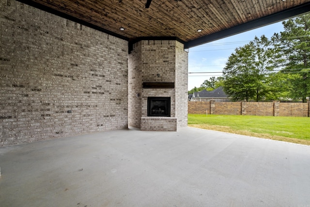 1500 Haley Ln, Conway, AR 72034 - view of patio featuring an outdoor brick fireplace