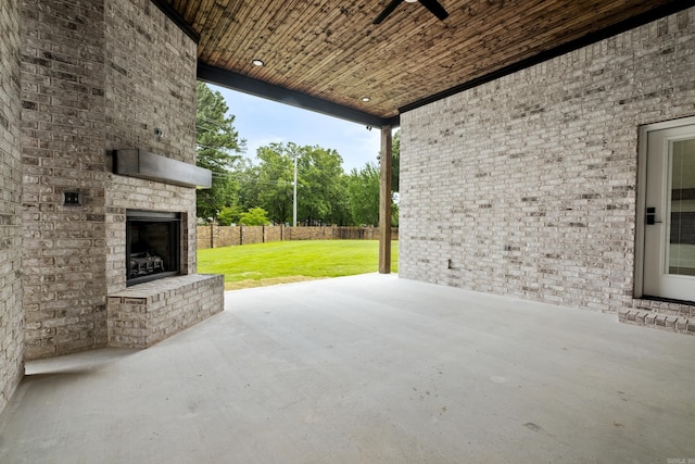 1500 Haley Ln, Conway, AR 72034 - view of patio featuring an outdoor brick fireplace and ceiling fan