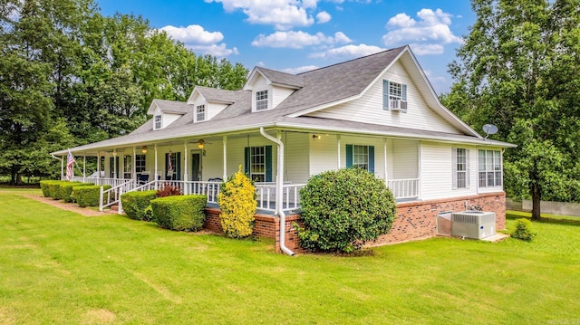 114 Woodiel Cir, Cabot, AR 72023 - farmhouse inspired home with a front yard, a porch, and roof with shingles