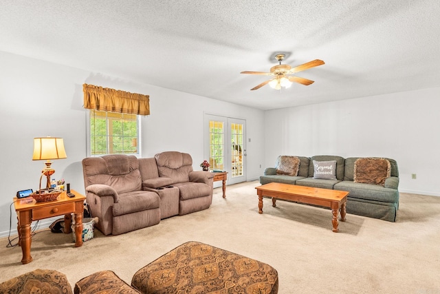 114 Woodiel Cir, Cabot, AR 72023 - living area featuring light colored carpet, a ceiling fan, and a textured ceiling