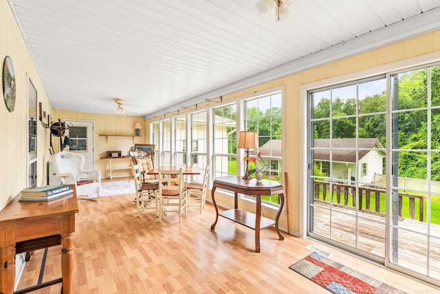 114 Woodiel Cir, Cabot, AR 72023 - sunroom with healthy amount of natural light, wood finished floors, and wood walls