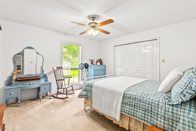 114 Woodiel Cir, Cabot, AR 72023 - carpeted bedroom with a closet, a ceiling fan, and a textured ceiling