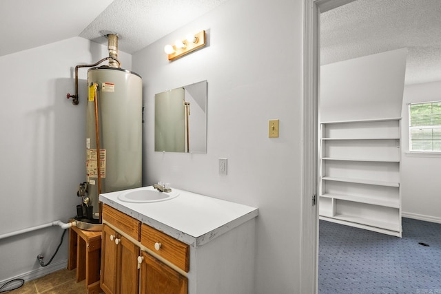 114 Woodiel Cir, Cabot, AR 72023 - bathroom featuring water heater, a textured ceiling, and vanity
