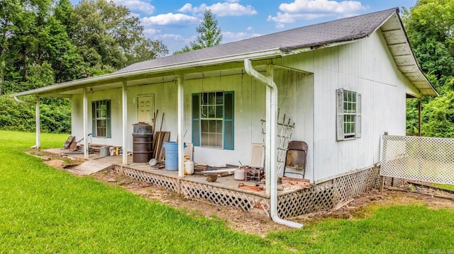 114 Woodiel Cir, Cabot, AR 72023 - view of front of home with covered porch, a front lawn, and a shingled roof