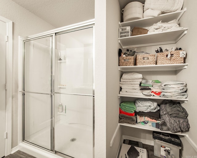 53 Dunnaway Dr, Ward, AR 72176 - bathroom featuring a shower stall