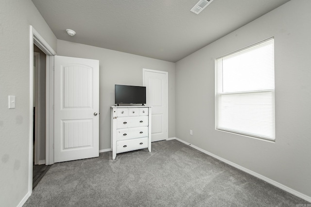 53 Dunnaway Dr, Ward, AR 72176 - unfurnished bedroom featuring carpet flooring and baseboards