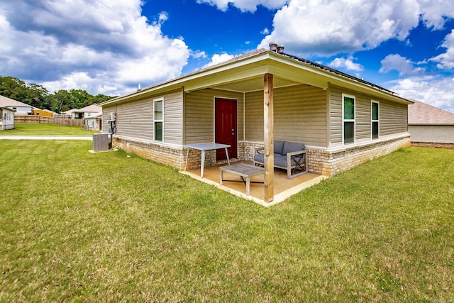 53 Dunnaway Dr, Ward, AR 72176 - rear view of property featuring a yard and a patio area