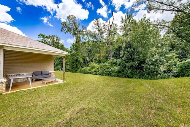 53 Dunnaway Dr, Ward, AR 72176 - view of green lawn featuring an outdoor living space and a patio