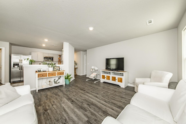 53 Dunnaway Dr, Ward, AR 72176 - living area with dark wood finished floors and recessed lighting