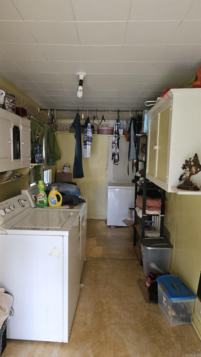 121 W 5th St, Rector, AR 72461 - laundry room featuring washing machine and clothes dryer and cabinet space