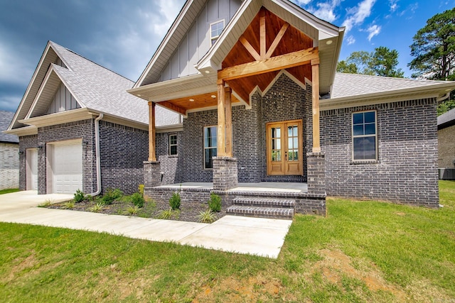 19 Denali Dr, Cabot, AR 72023 - craftsman house with board and batten siding, brick siding, roof with shingles, and a front lawn