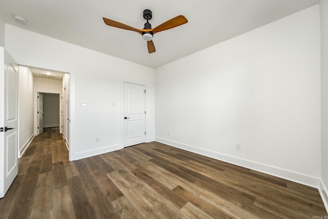 19 Denali Dr, Cabot, AR 72023 - unfurnished bedroom with dark wood finished floors, attic access, and ceiling fan