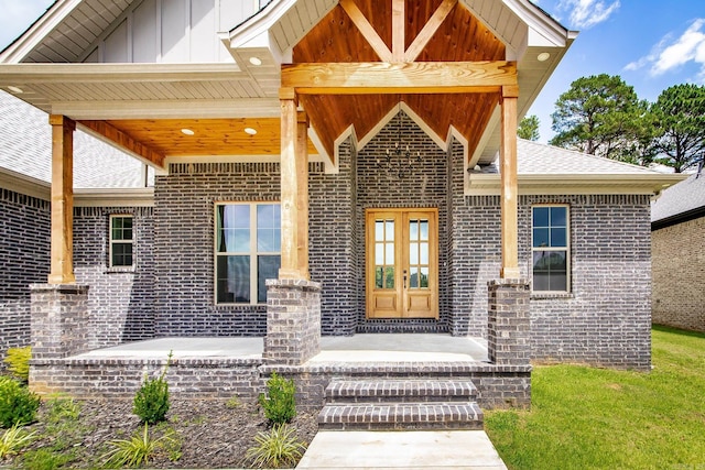 19 Denali Dr, Cabot, AR 72023 - property entrance with board and batten siding and brick siding
