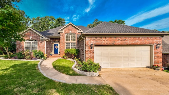 181 Diamond Pointe Dr, Maumelle, AR 72113 - view of front of house with brick siding, a garage, driveway, a front yard, and roof with shingles