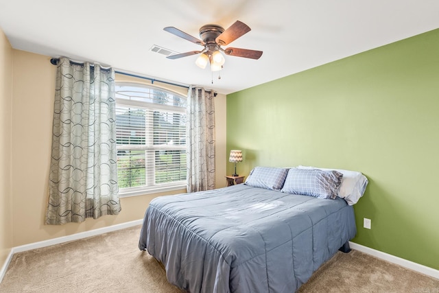 181 Diamond Pointe Dr, Maumelle, AR 72113 - bedroom with carpet floors, multiple windows, and ceiling fan