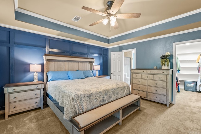 181 Diamond Pointe Dr, Maumelle, AR 72113 - carpeted bedroom with crown molding, a decorative wall, a spacious closet, a ceiling fan, and a closet