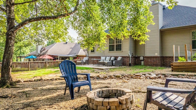 181 Diamond Pointe Dr, Maumelle, AR 72113 - view of yard featuring a patio area and an outdoor living space with a fire pit