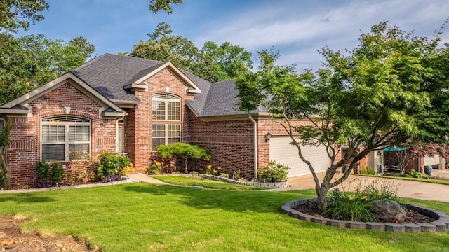 181 Diamond Pointe Dr, Maumelle, AR 72113 - view of front of property featuring brick siding, driveway, a shingled roof, a front lawn, and a garage