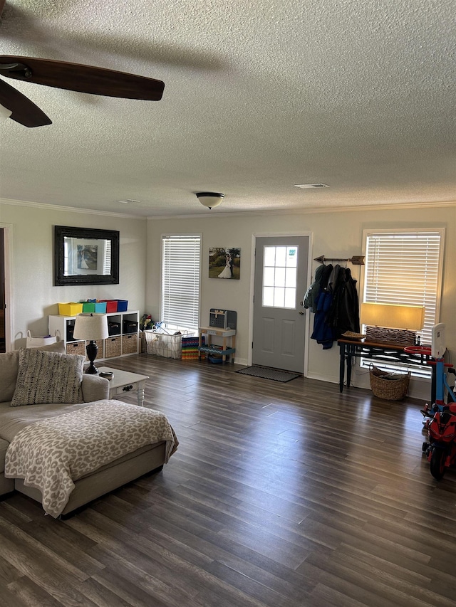 497 Law 611, Walnut Ridge, AR 72476 - living area featuring a textured ceiling, wood finished floors, and ceiling fan
